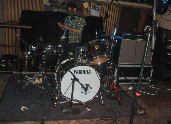 Dane setting up his drum kit in The Cellar