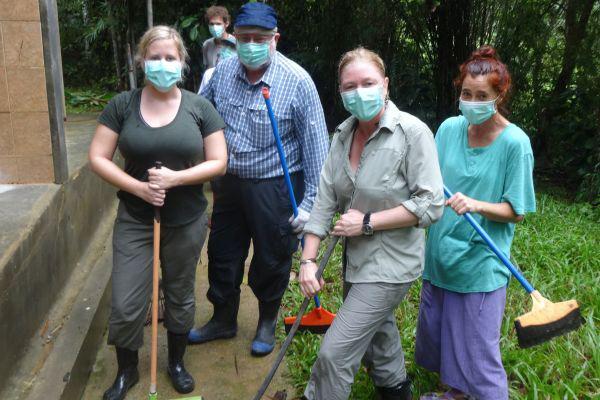 Volunteers Cleaning Enclosures at Samboja Lestari